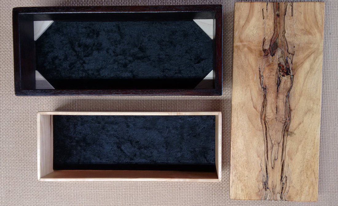Detailed interior view handmade mahogany, maple, wood treasure box